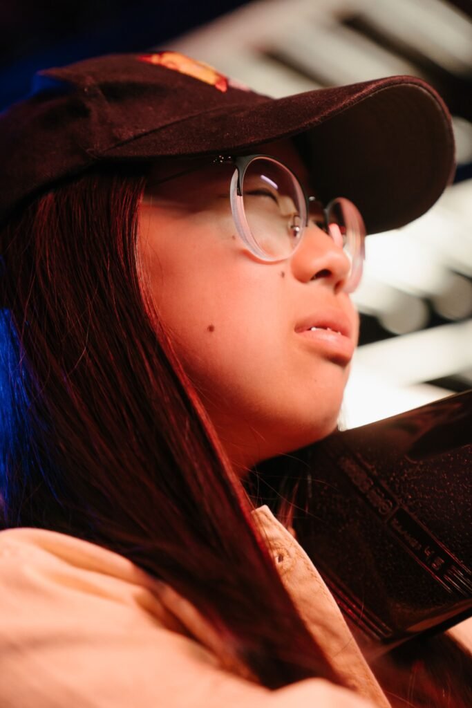 pexelsphoto48363794836379 Crystal Clear Eye Clinic Best Eye Clinic in Andheri Mumbai Close up portrait of teenage girl with glasses and cap indoors showcasing youthfulness